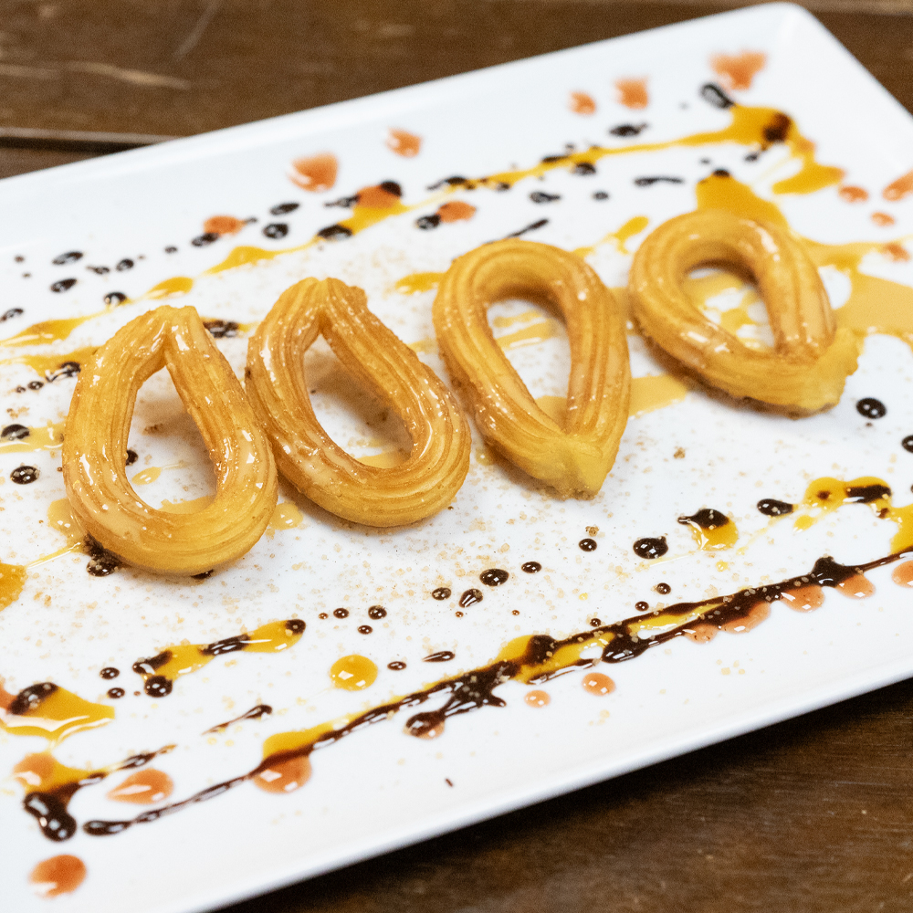 Genieße authentische Churros, mexikanische Eiscreme und Frappés als Nachspeise oder Snack für zwischendurch.