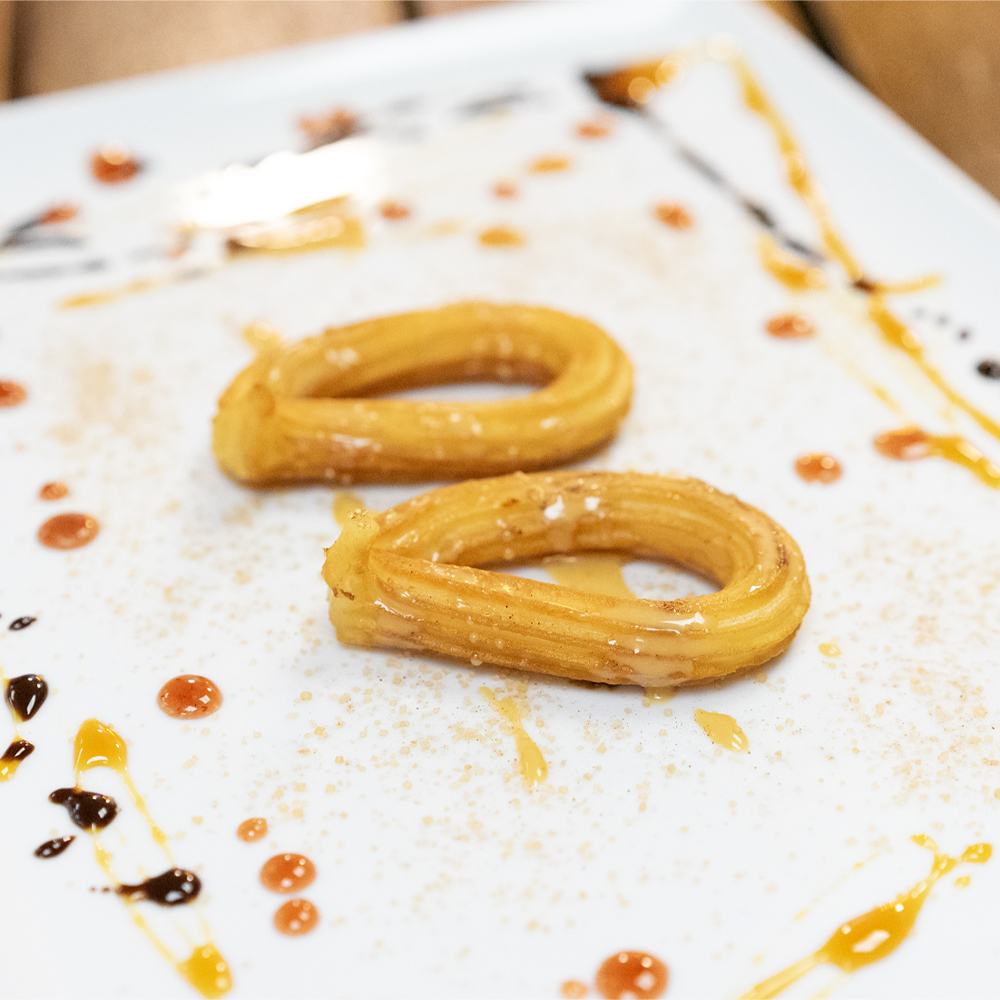 Genieße authentische Churros, mexikanische Eiscreme und Frappés als Nachspeise oder Snack für zwischendurch.